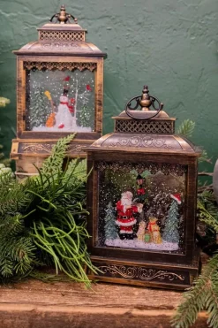 11" Battery Operated Lighted Musical Spinning Water Globe with Holiday Scene and Timer