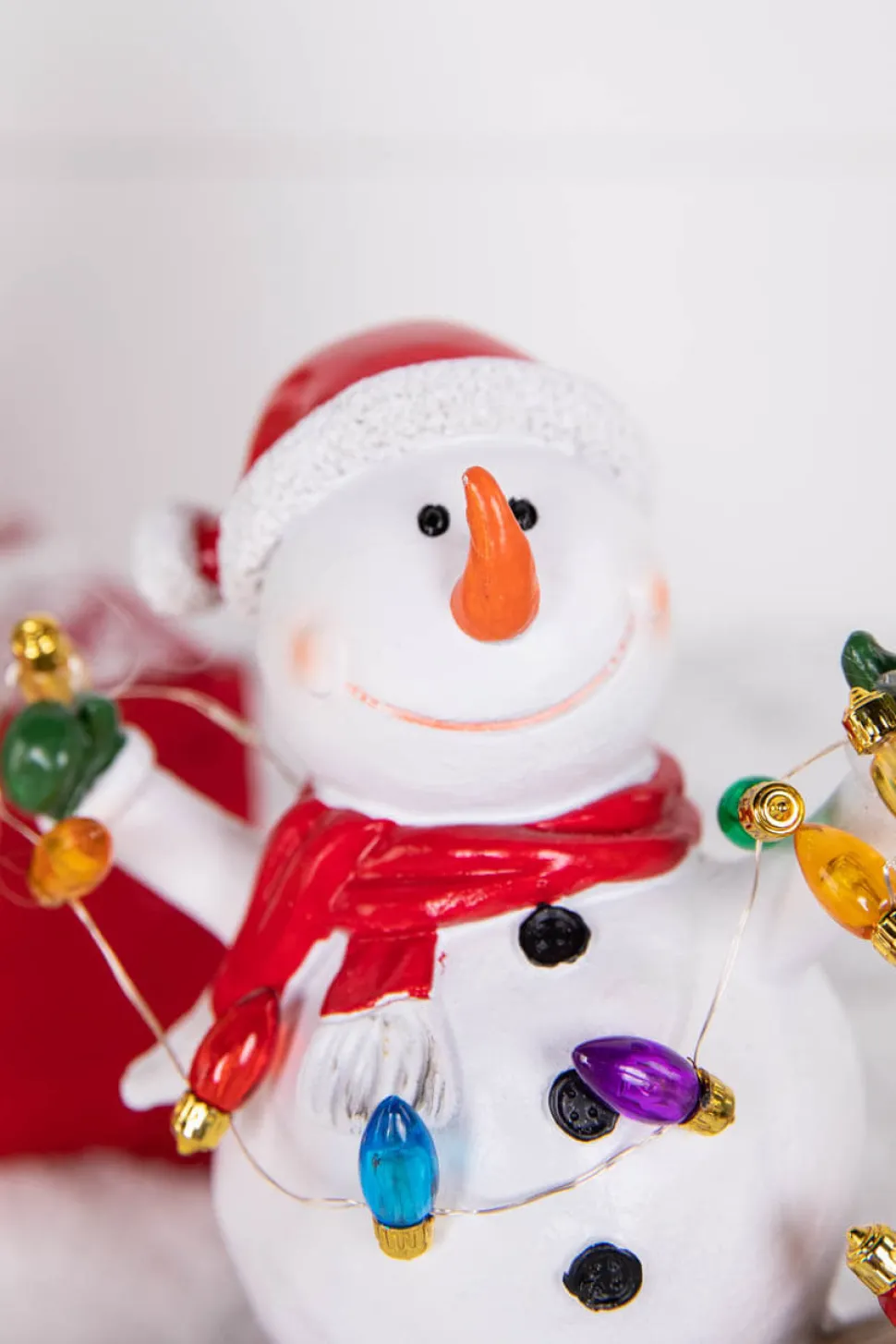 7.4” B/O Lighted Resin Skiing Snowman with Light String