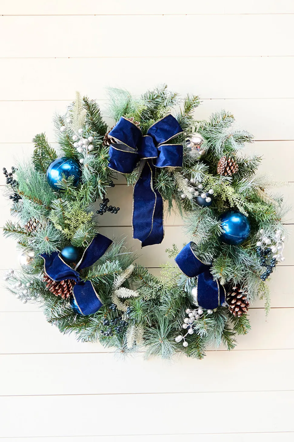 30" Holiday Pine & Pinecone Wreath with Bow Accent