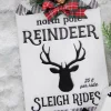 12” Metal Embossed Holiday Wall Sign with Floral Accent