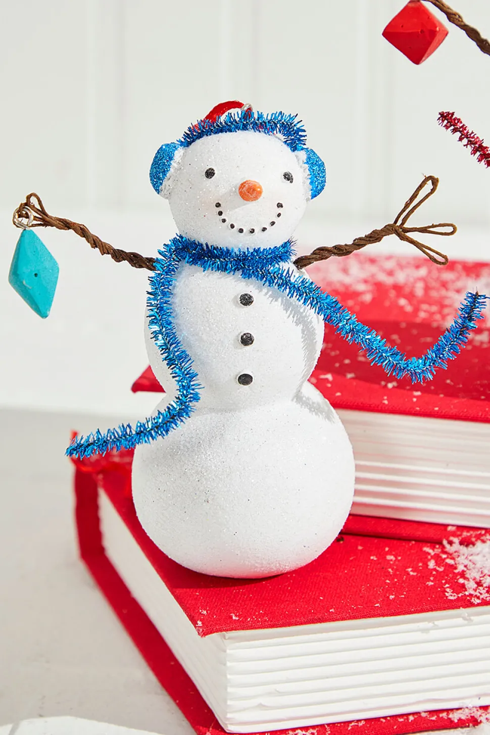 4" Resin Snowman with Blue/Red Earmuffs and Scarf Ornament